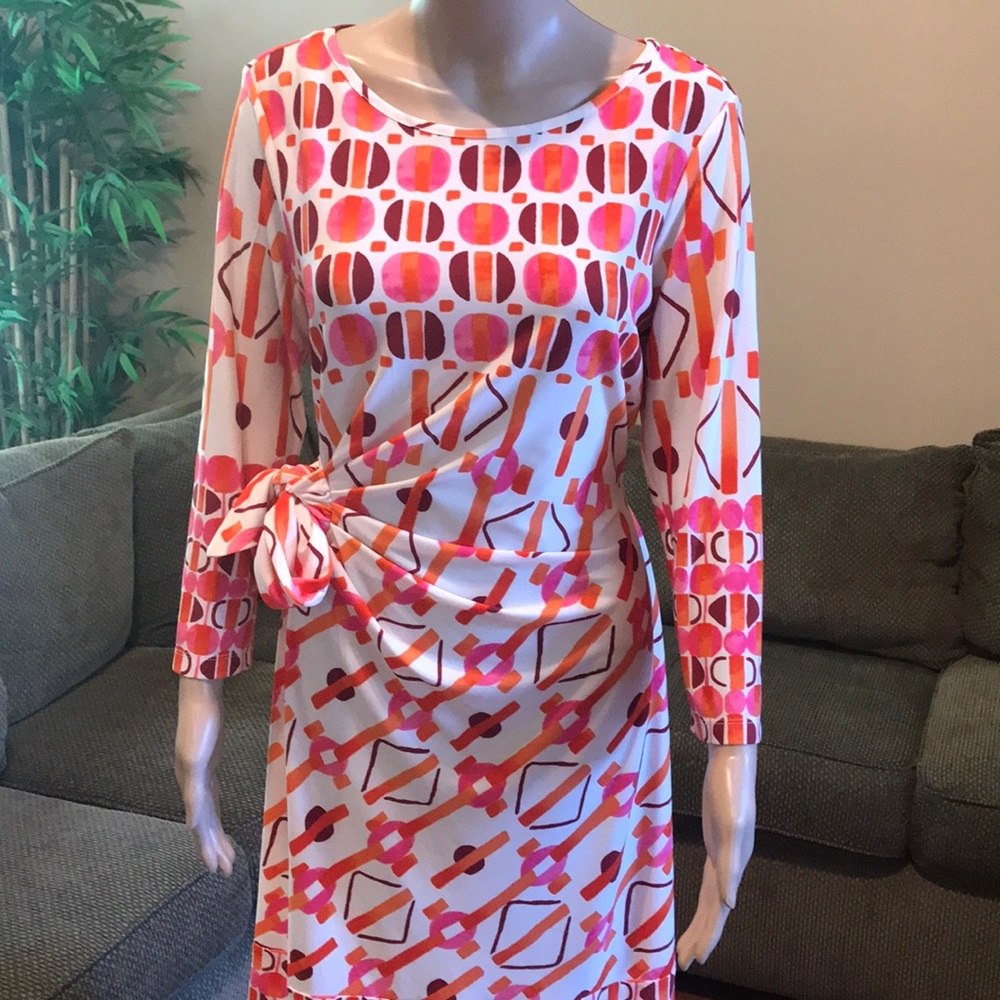 Multi color faux wrap long sleeve dress.